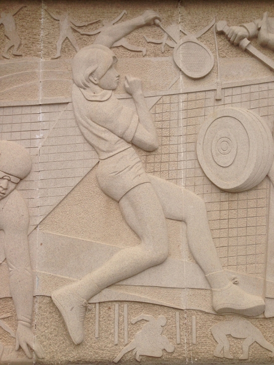 Bas-relief of badminton player.